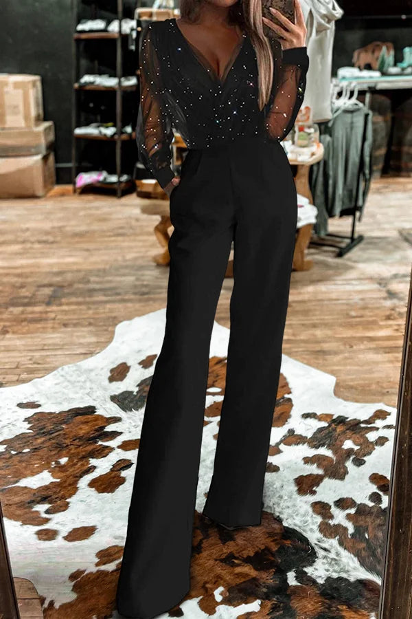 Islie | Mono con mangas transparentes y pantalones anchos