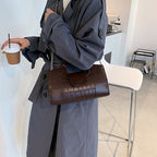 Tristan | Bolso de mano efecto cocodrilo