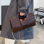 Tristan | Bolso de mano efecto cocodrilo
