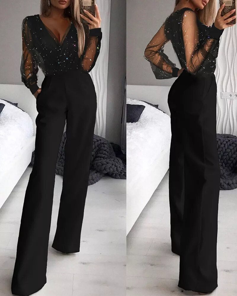 Islie | Mono con mangas transparentes y pantalones anchos