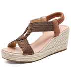 Mia | Sandalias de cuña con trenzado
