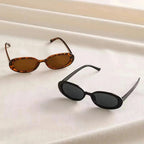 Gafas de sol retro ovaladas mujer – lentes negras UV400 estilo vintage
