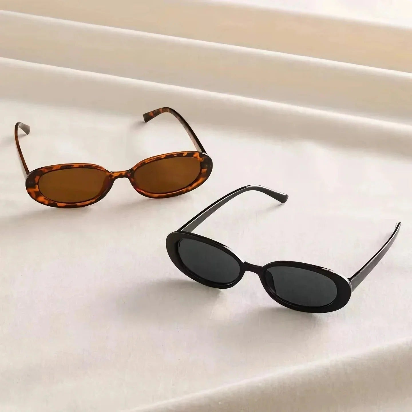 Gafas de sol retro ovaladas mujer – lentes negras UV400 estilo vintage