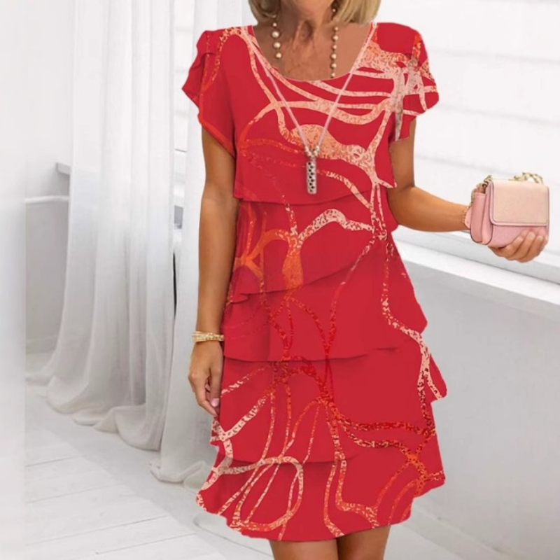 Clara | Vestido elegante de mujer con volantes en el bajo